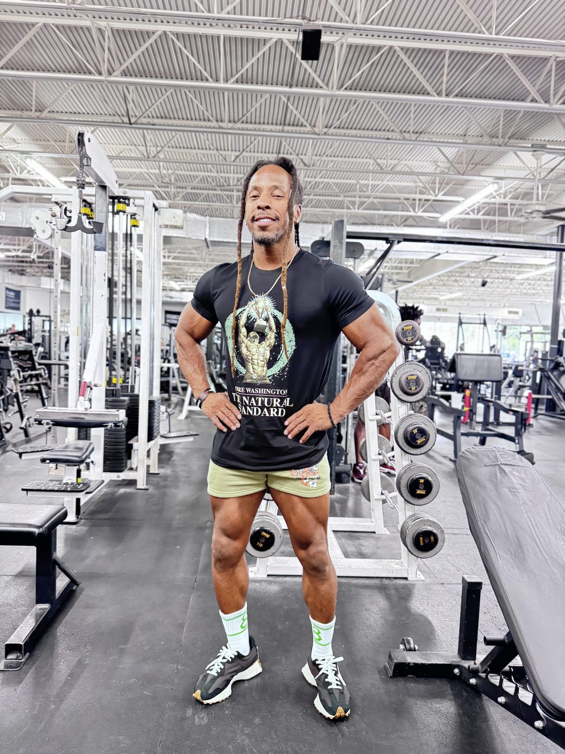 Torre Washington wearing the Winning Without Compromise tee